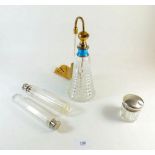 A large silver and enamel mounted cut glass perfume atomiser and three cut glass and silver