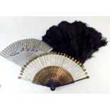 A 19th century painted lacquer and silk fan, a grey floral painted wooden fan plus an ostrich