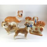 A pair of Staffordshire spaniels with blue ribbons - 19cm, a large Staffordshire collie dog, and