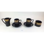 A 1960's Portmeirion Greek Key set of twelve coffee cups and saucers with jug and sugar