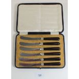 A set of six silver tea knives by Harrison Bros, 1922, cased