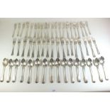 A large selection of silver dinner forks and spoons dating from Georgian to 20th century - 2930g