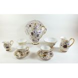 A 1930's Tuscan china tea and coffee service with floral printed and gilt decoration comprising