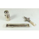A Victorian silver and mother of pearl rattle 'Darling', a silver pencil and silver smelling salts