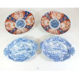 Two oval Imari fluted dishes and two Seton Ware blue and white dishes