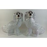 A pair of large Victorian Staffordshire dogs with glass eyes - 32cm