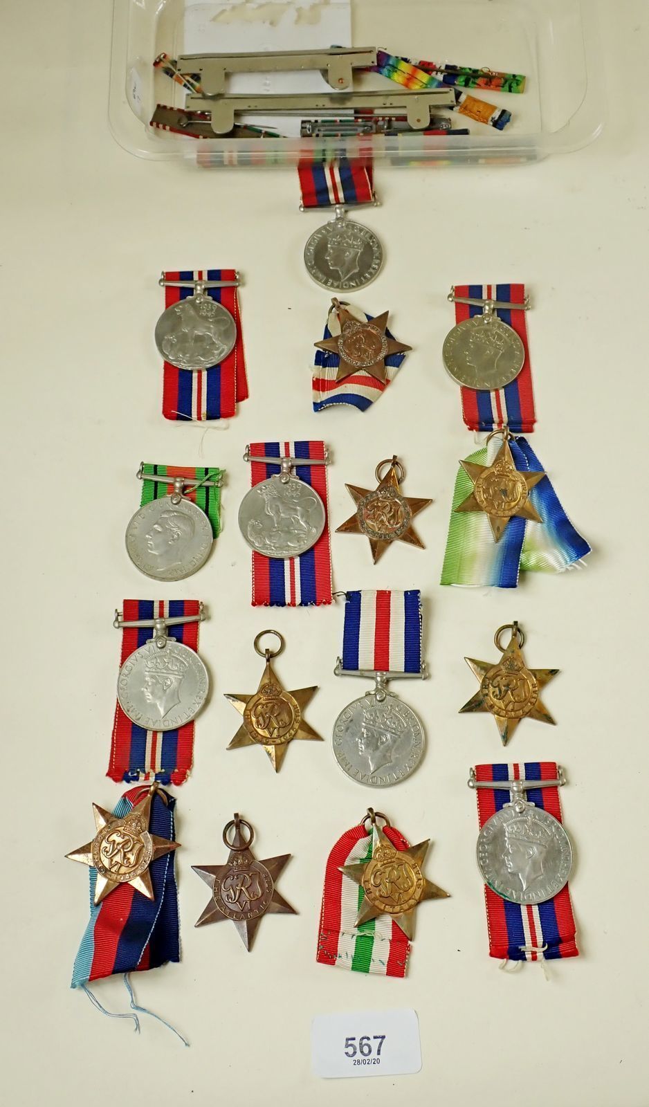 A quantity of WWII medals, stars and medal bars