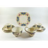 A Grosvenor China tea service 'Windsor' comprising: six cups and saucers, six tea plates, cake