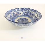 A Japanese blue and white Imari bowl decorated flowers and foliage - 25cm dia