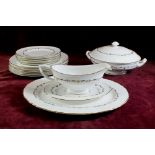 A Royal Worcester 'Gold Chantilly' part dinner service comprising:- tureen, gravy, meat plate, six