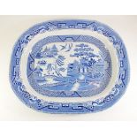 A large Victorian Staffordshire willow pattern meat plate - 55 x 43cm