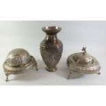 A Persian white metal vase and two caviar dishes