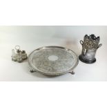 A silver plated bottle holder, a silver plated tray and a silver plated cruet stand