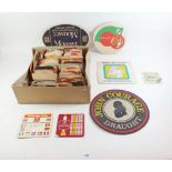 A collection of vintage beer mats