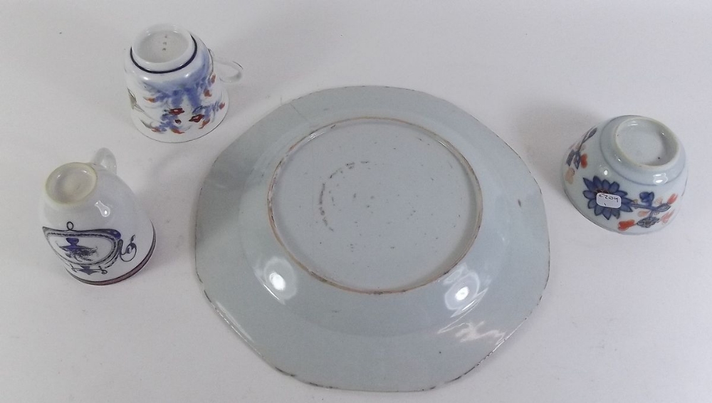 An 18th century Chinese blue and white plate painted landscape, three cups and a spoon - Image 2 of 2