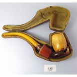 A 19th century large meerschaum pipe in the form of a lady's hand, cased