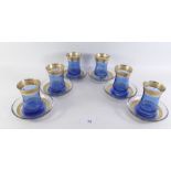 Six blue and gilt glass coffee cups