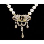 An 18 carat gold and pearl necklace with Art Nouveau style diamond set pendant