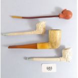 Two Victorian clay pipes in the form of soldier's heads and two other pipes
