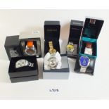 A selection of eight modern gentleman's wrist watches with original boxes