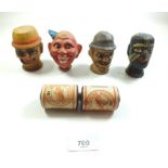 Three Austrian painted wooden novelty heads and a painted composition puppet head