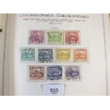 An Illustrated 'Minkus' Czechoslovakia album of mint and used defin/commem stamps from 1918 on.