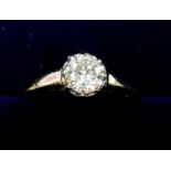 An 18 carat gold and platinum set diamond solitaire ring - approx half carat - size M