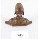A small bronze finish bust of a Dutch woman with hat, 5.5 x 7.5cm, mounted on a brass base