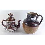 A Doulton Stoneware jug and a small Barge ware teapot