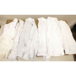 Three Victorian white cotton petticoats, two men's shirts, a christening gown, apron, pair of