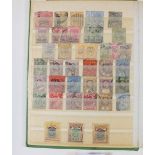 A green stockbook of Malaya stamps, mint and used, Strait Settlements and other states including KGV
