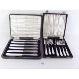 A set of six silver tea knives - Sheffield 1921, and a set of silver plated cake forks - cased