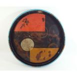 A Japanese circular lacquer tray