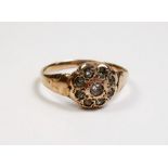 An Edwardian 9 carat gold cluster ring set white stones - size N