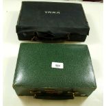 A vintage blue canvas clad correspondence case and a green leather travel jewellery box