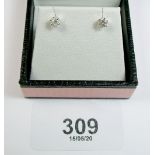 A pair of 18 carat white gold diamond set earrings