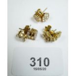 Three pairs of gold earrings - 7 grams.