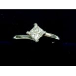 A platinum princess cut solitaire diamond ring 0.52cts, together with insurance certificate and