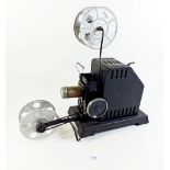 A British Bing hand cranked 35mm cine projector circa 1930