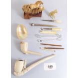 A small box of miscellaneous items to include clay pipes, Meerschaum horse pipe (A/F) etc