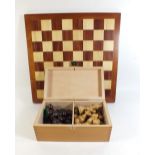 A chess set box and marquetry chess board