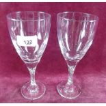 A set of seven large wine goblets