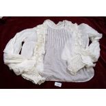 An Edwardian muslin blouse with pintucks and lace