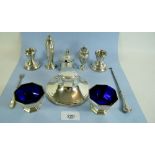 A collection of small silver items to include capstan inkwell, salts, a pair of squat