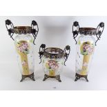 A garniture of three 19th century continental glass vases painted roses on gilt panels, with gilt