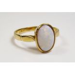 A 22 carat gold opal set ring - size S