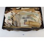 A small suitcase stuffed full of stamps, envelopes, cinderellas and ephemera from QV period on - all