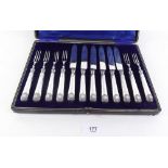 A silver handled dessert cutlery set of six fruit knives and forks - cased - Sheffield 1906