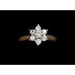 A 9 carat gold diamond cluster ring, size J