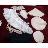 A box of antique lace collars and scarves, and a set of table mats etc